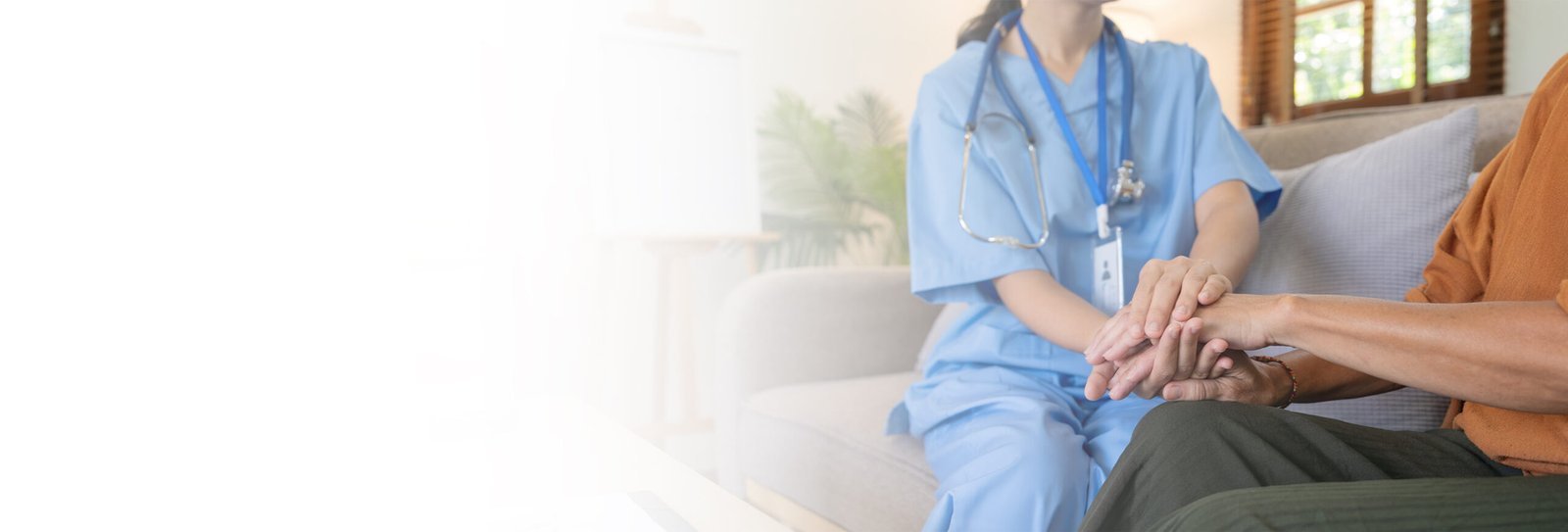 A caregiver offering reassuring support at home